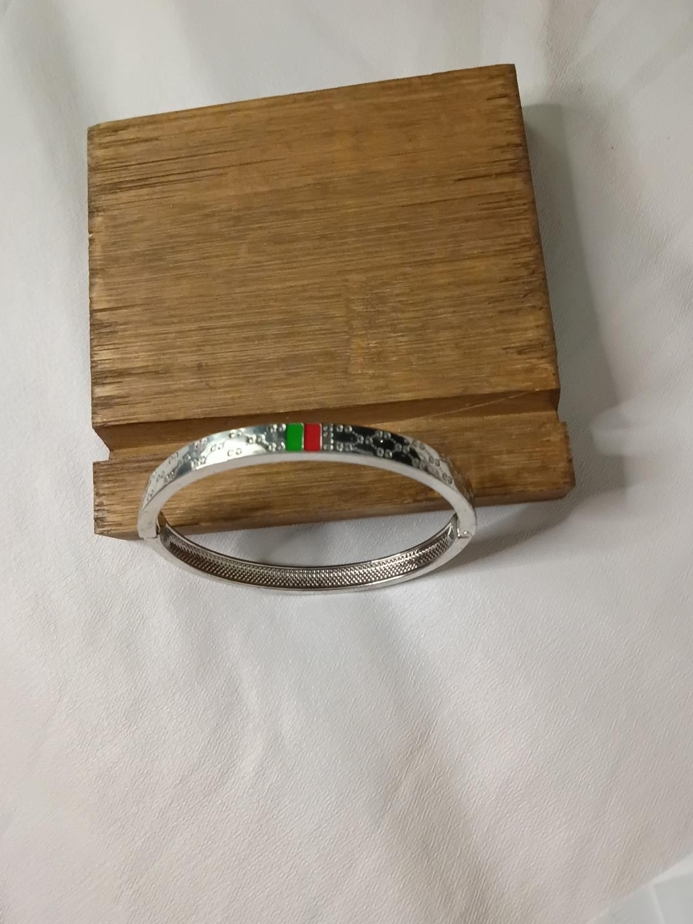 Silver Tone Women’s Bangle Bracelet with Red and Green Accent